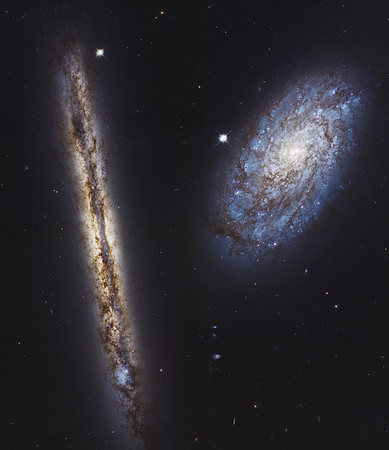 A New Angle on Two Spiral Galaxies for Hubble's 27th Birthday