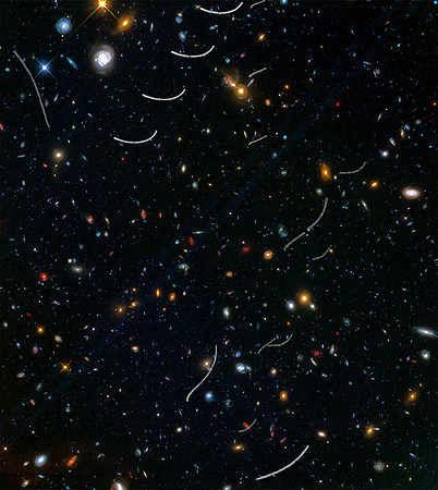 Hubble Sees Nearby Asteroids Photobombing Distant Galaxies