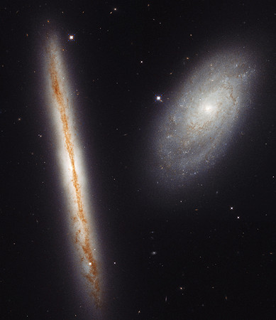 A New Angle on Two Spiral Galaxies for Hubble's 27th Birthday